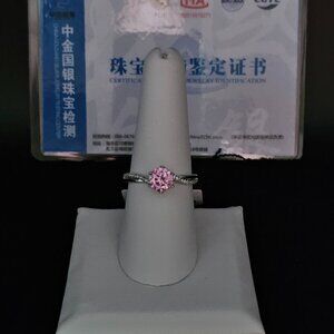 Beautiful pink Moissanite 1 CT solitaire in sterling silver. Size 8